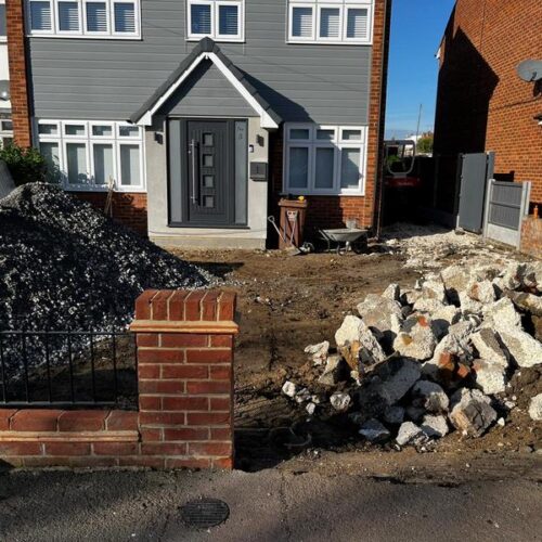 front charcoal block paved driveway side entrance 32